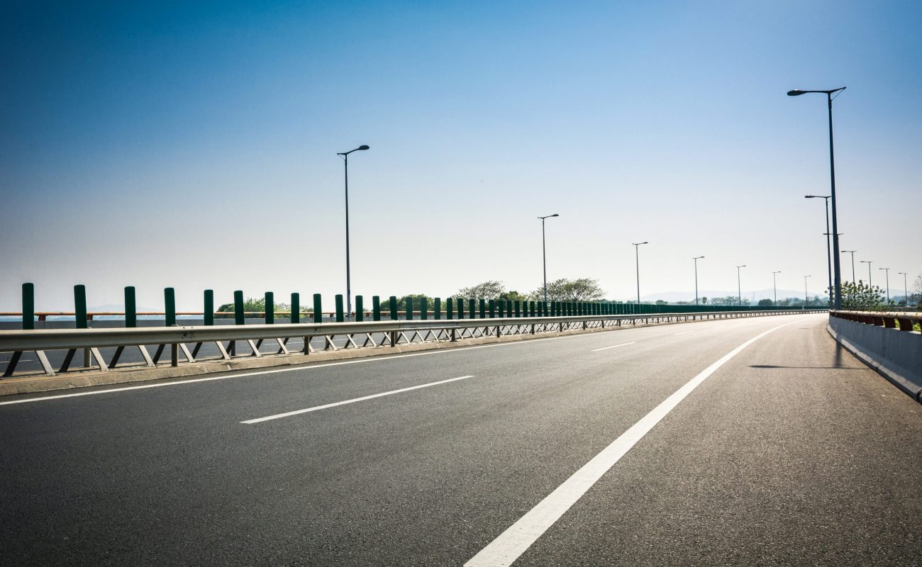 asphalt road and forest